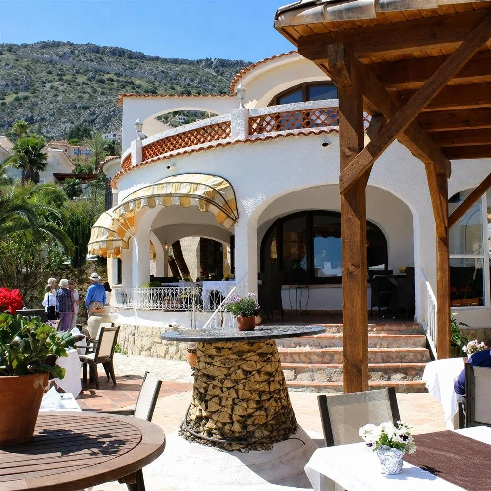 Sunny cafe terrace in Calpe for breakfast near Casa Toro